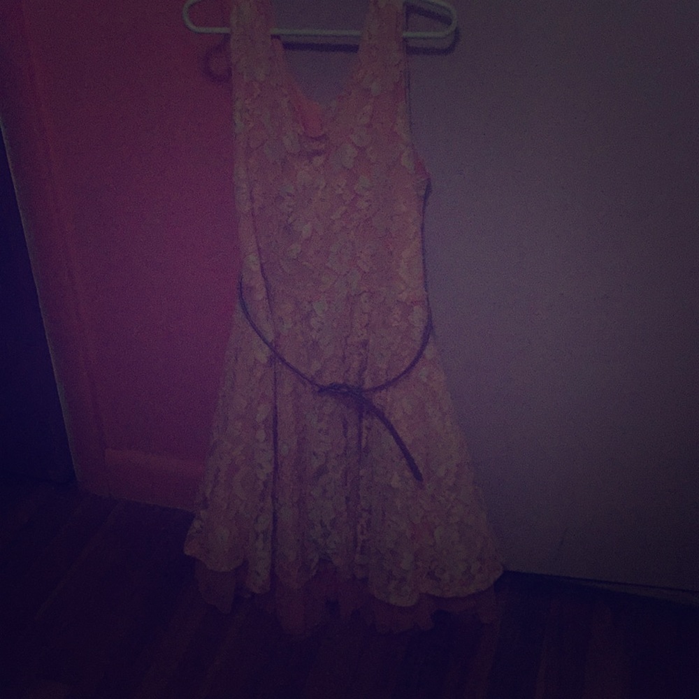 A pink dress with flowers on it